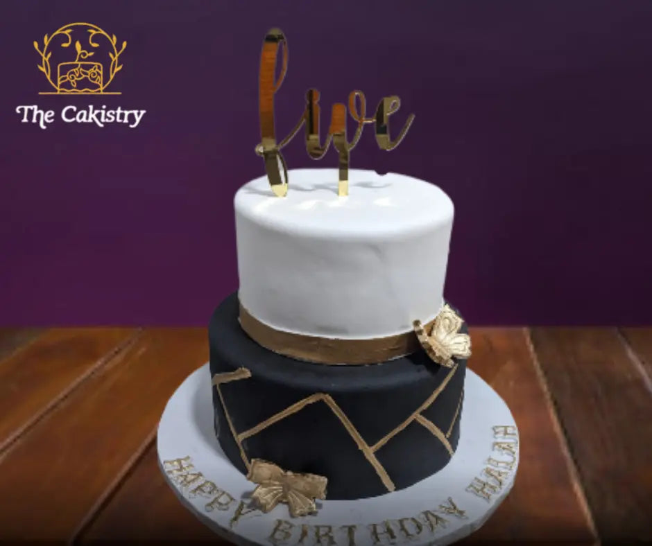 Black, white and gold cake