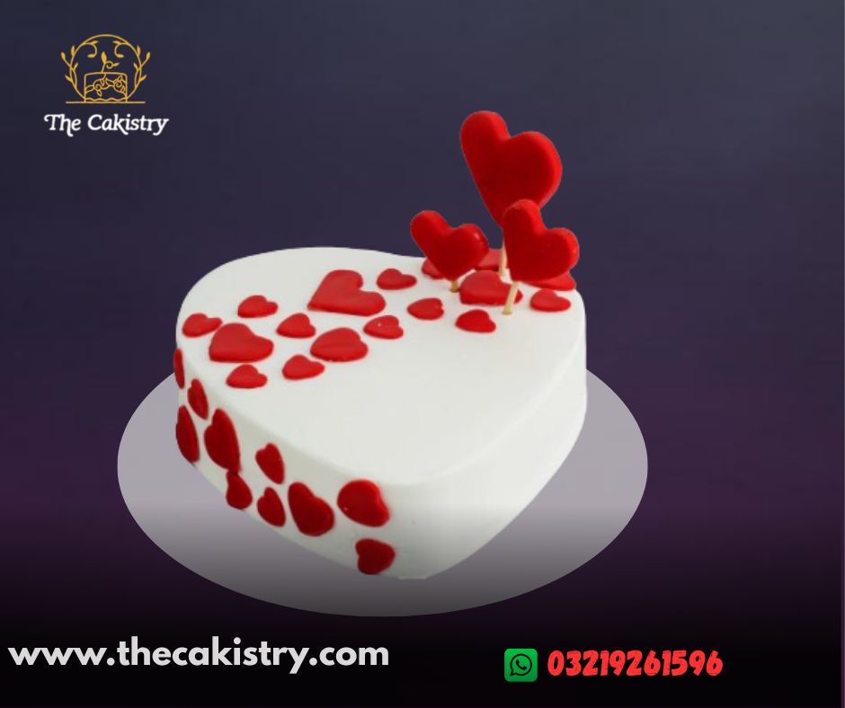 Heart Shape Cake with red hearts and white base from The Cakistry - frontal