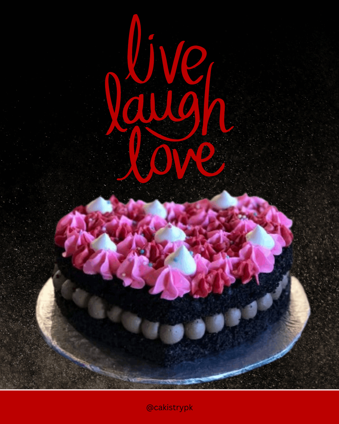 Heart-shaped cake with pink and white frosting on a dark background with 'live laugh love' text.
