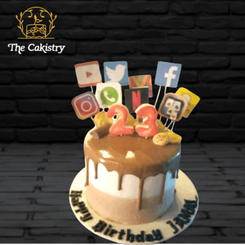 Chocolate Birthday cake with social media icons featuring 'The Cakistry' brand.