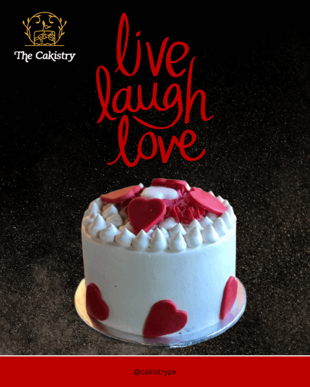Small white cake with red hearts, branded 'The Cakistry'.